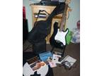 ELECTRIC GUITAR,  with amp,  stand,  carry case,  books, ...